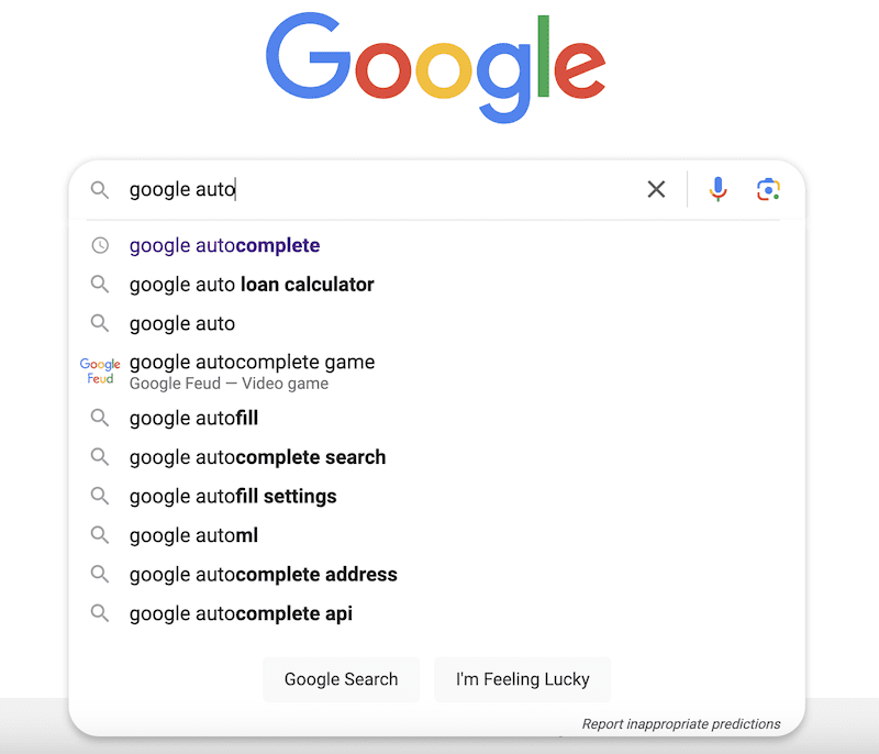 A Google search bar with the query "google auto" typed in, showing predictive search suggestions including "google autocomplete," "google auto loan calculator," "google auto," "google autocomplete game," and more. The "Google Search" and "I'm Feeling Lucky" buttons are below.