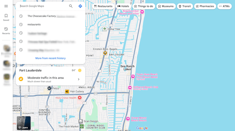 A digital map showing the Fort Lauderdale area, with several locations pinned, including restaurants and beaches. The map displays roads and a search bar with recent search history. The right side shows the blue outline of the Atlantic Ocean.