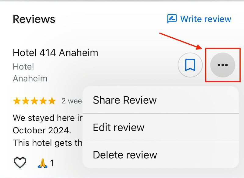 Screenshot of a review for Hotel 414 Anaheim. It shows a 5-star rating, a review preview, and an options menu with "Share Review," "Edit review," and "Delete review" choices. An arrow points to a bookmark and three-dot icon.