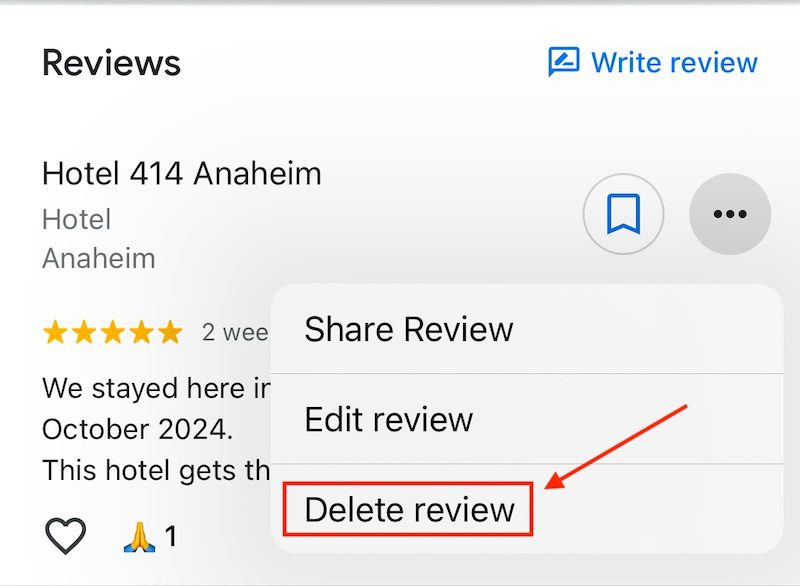 A mobile app screen showing a review for Hotel 414 Anaheim. The review is rated with five stars and was posted two weeks ago. An options menu is open with "Share Review," "Edit review," and a highlighted "Delete review" option.