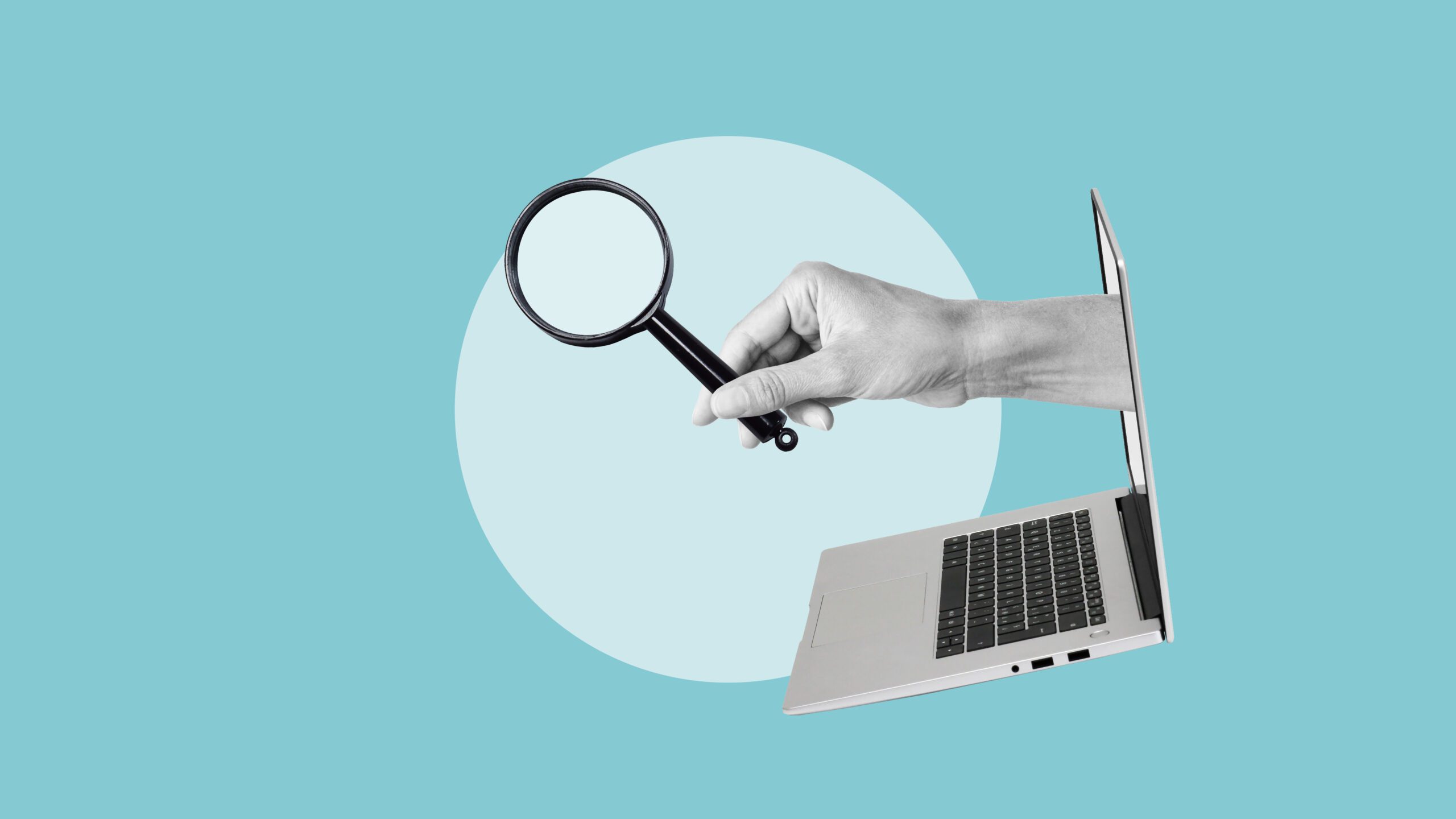 A hand holding a magnifying glass emerges from a laptop screen against a blue background. This symbolizes the concept of online search or investigation.