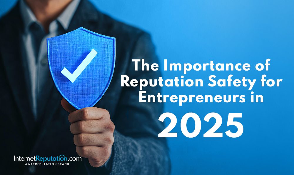 Person in a suit holding a blue shield with a checkmark emphasizes "Reputation Safety for Entrepreneurs in 2025." Bottom left displays InternetReputation.com's logo. The background is a solid blue, underscoring the critical nature of this evolving necessity.