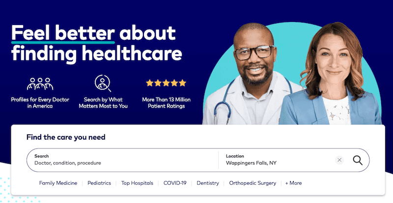 Healthcare website homepage featuring a smiling male doctor and a female professional against a blue background. Text highlights profiles for doctors, search options, and patient ratings. A search bar below invites users to find local medical care by specialty and location.